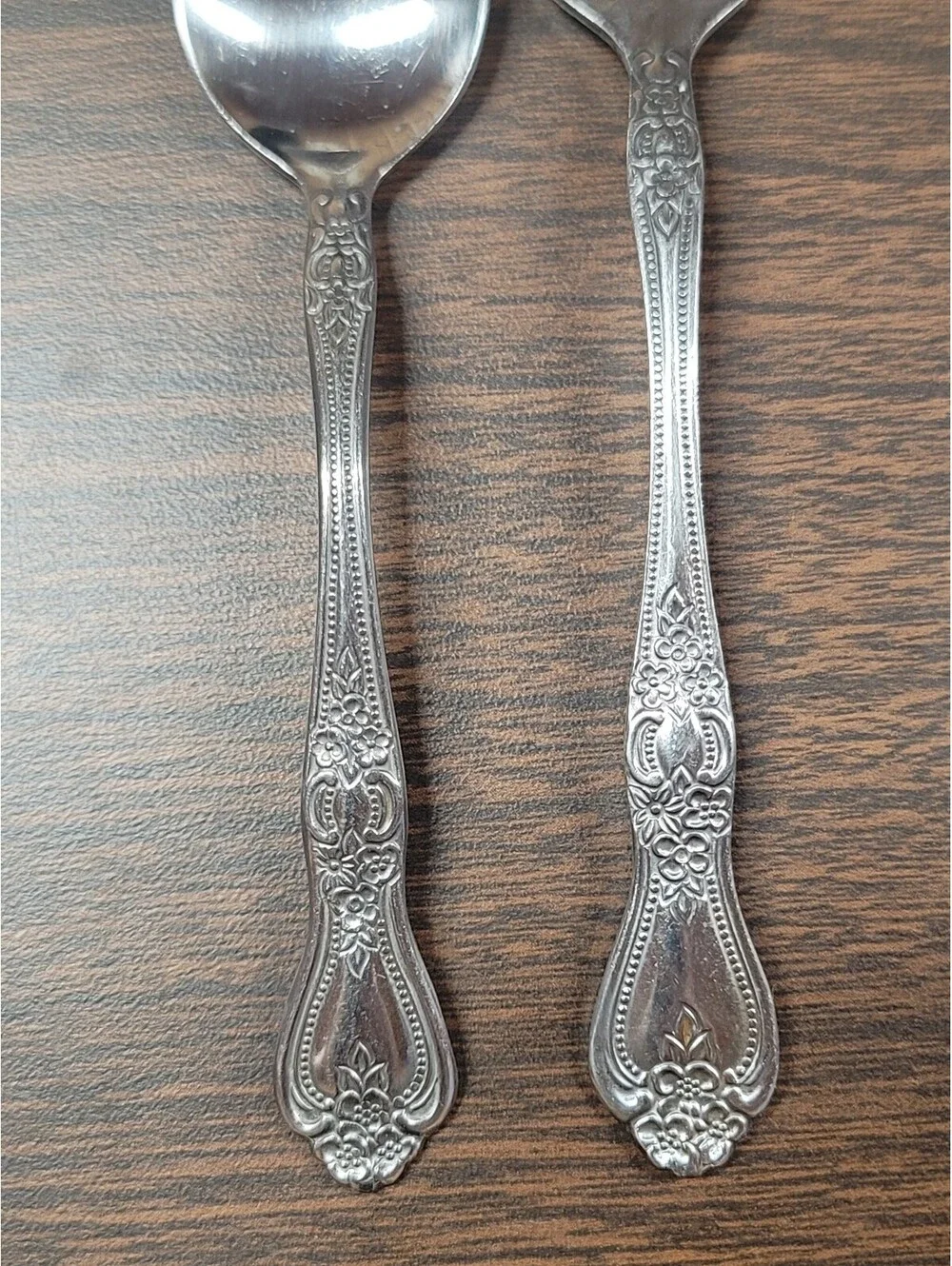 Vintage Stainless Steel Spoon and Fork Set with Ornate Floral Handles